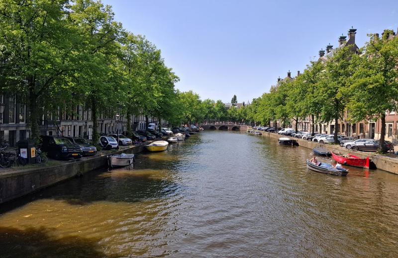 King's Day in Amsterdam: The Orange City, the Canal Boats and the Nation-Wide Flea Market