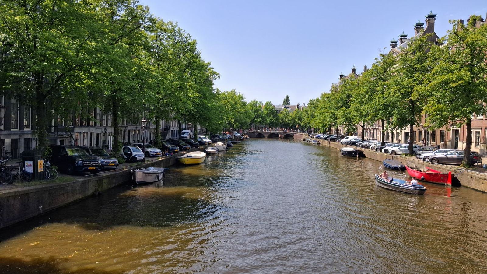 King's Day in Amsterdam: The Orange City, the Canal Boats and the Nation-Wide Flea Market